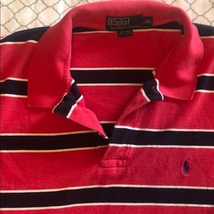 Off red and blue striped polo shirt